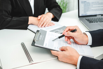 Wall Mural - Senior manager HR reading a resume during a job interview employee young woman meeting Applicant and recruitment. Interview concept