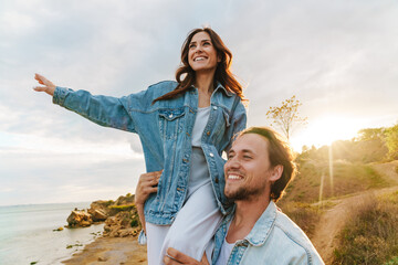 Wall Mural - Beautiful happy young couple in love spending time together