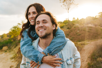 Wall Mural - Beautiful happy young couple in love spending time together