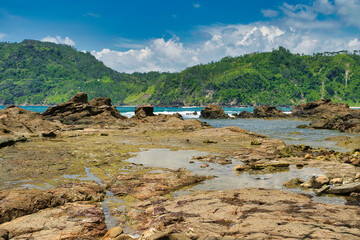 Wall Mural - beach and rocks mountain