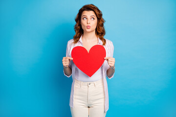 Wall Mural - Portrait of her she nice attractive lovely cute dreamy wavy-haired girl holding in hands big paper heart sending air kiss isolated on bright vivid shine vibrant blue color background