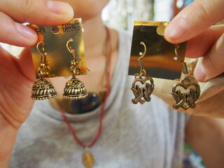 Pretty earrings we found at the market, Thiruvananthapuram (Trivandrum), Kerala, India