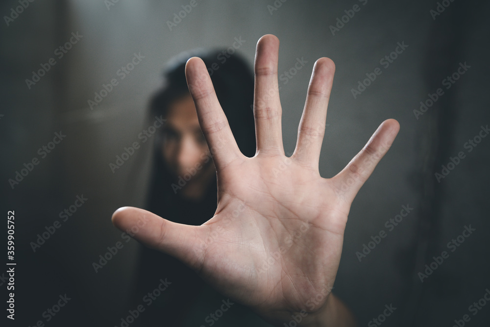 woman raised her hand for dissuade, Abuse, campaign stop violence against women. Stop sexual harassment and rape. - obrazy, fototapety, plakaty 