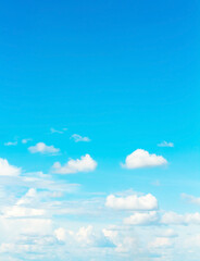 Wall Mural - sky and clouds nature background,vertical sky,many clouds floating on colorful blue sky with sun light