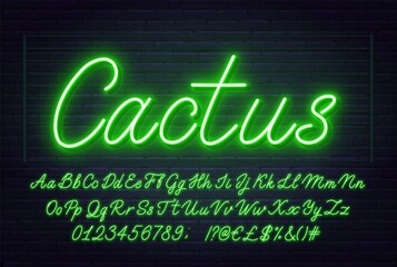 Aufkleber - Neon green script font. Glowing alphabet with letters, numbers and special characters on a brick background.