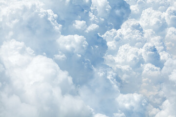 White & blue soft cumulus clouds in the sky close up background, big fluffy cloud texture, beautiful cloudscape skies backdrop, sunny cloudy heaven pattern, cloudiness weather landscape, copy space