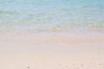 Sandy beach and blue sea in summer