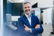 © Westend61 - Portrait of a confident businessman in a factory