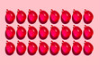 © Westend61 - Studio shot of rows of red water balloons
