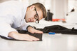 © Westend61 - Fashion designer examining fabric