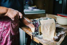 Italian Woman Making Pasta Sheets