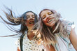 © JImena Roquero/Stocksy - Teenagers laughing looking at camera