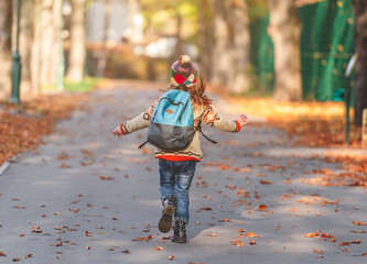 Rear view of school kid