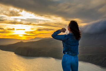 Wall Mural - Girl at sunset