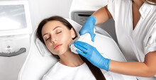 Elos Epilation Hair Removal Procedure On The Face Of A Woman. Beautician Doing Laser Rejuvenation In A Beauty Salon. Facial Skin Care. Hardware  Ipl Cosmetology