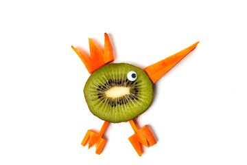 Food art creative concepts.Cute bird couple made of kiwi and carrots isolated on white background.