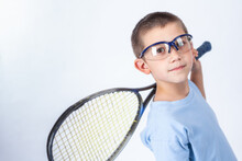 Young Squash Player With Protective Glasses And Squash Racket