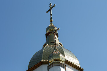 golden domes of the church against the blue sky