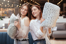 Happy Young Women Having Fun While Shopping For Home Goods Together