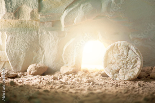 Jesus Christ resurrection. Christian Easter concept. Empty tomb of Jesus with light. Born to Die, Born to Rise. \
