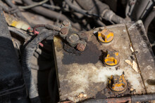 Oxidized And Dirty Car Battery Terminal. Battery Terminals Corrode Dirty Damaged Problem. Old Battery Corrosion Deteriorate Leaking With Acid Powder.