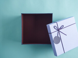 Canvas Print - Open blue christmas gift box.