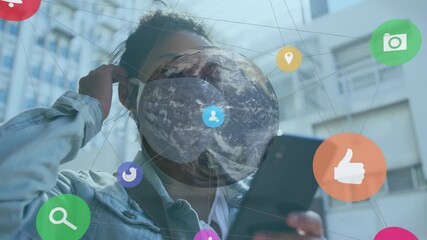 Poster - Animation of spinning globe and web of connections with social icons over mixed race woman