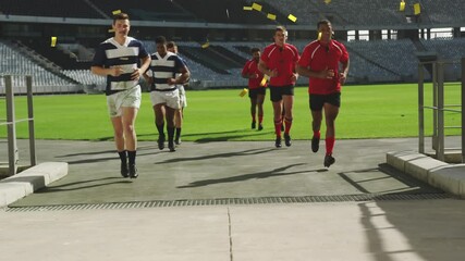 Poster - Animation of golden confetti falling over two multi-ethnic rugby teams running off a pitch 