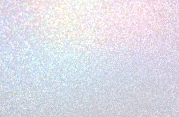 Iridescent shimmer blurred texture. Light pink blue yellow ombre background.