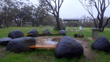 Park With Seats And A Camp Fire Place On A Wet And Windy Day