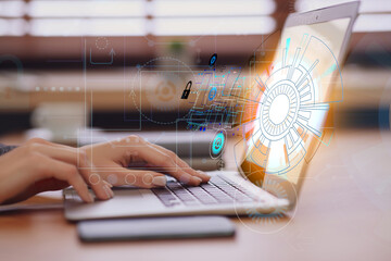 Woman working with laptop at table, closeup. Modern technology concept