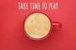 © New Africa - Work-life balance concept. Cup of aromatic coffee on red background, top view