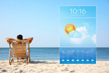 Wall Mural - young man relaxing in deck chair on sandy beach and weather forecast widget. mobile application