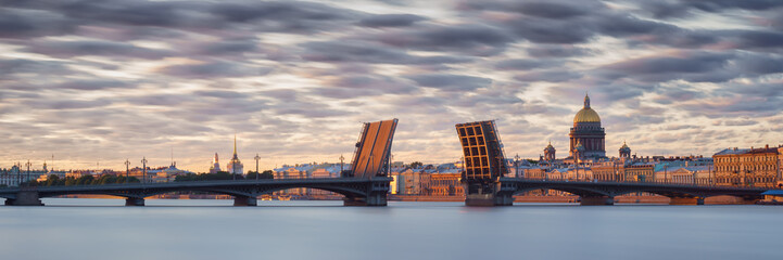 Neva river in Saint Petersburg panoramic view with divorced bridge at white nights