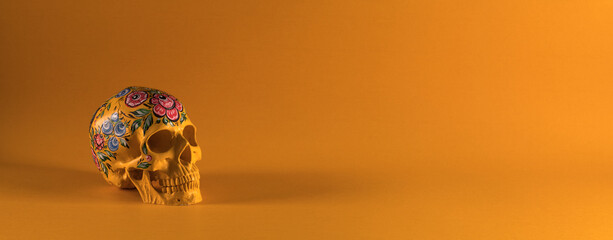 Day of the Dead, mexican skull isolated on orange background