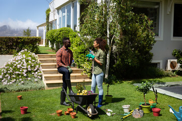 Wall Mural - Family gardening together