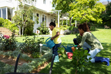 Wall Mural - Family gardening together