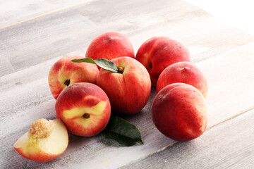 Wall Mural - A group of ripe peaches on wooden table