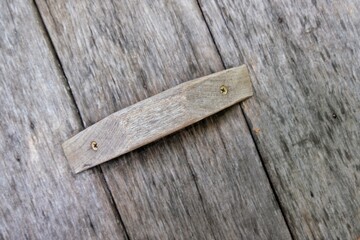 The lid of the jar is made of old wood.