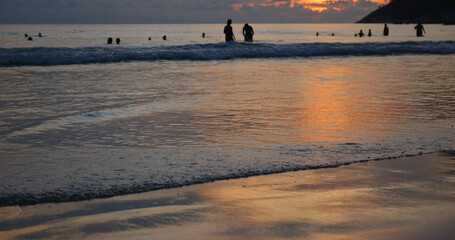 Poster - Sunset on sand beach in golden color