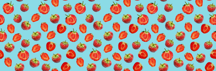 Wall Mural - Seamless food pattern, ripe strawberries on a blue background. 