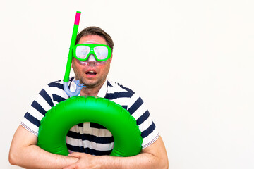 Joyful brunette hair man hold float wears tube mask wear goggles white trendy style striped t shirt white background