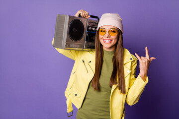 Poster - Portrait of her she nice attractive lovely fashionable cool cheerful girl dancing carrying player showing horn sign isolated over bright vivid shine vibrant lilac purple violet color background