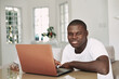 © SHOTPRIME STUDIO - Male african american freelancer with laptop