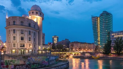 Wall Mural - Panoramic view of Urania with other buildings and Danube Canal day to night transition timelapse in Vienna. Urania is a public educational institute and observatory