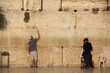 Jewish people praying to the Jerusalem's western wall, the wailing wall