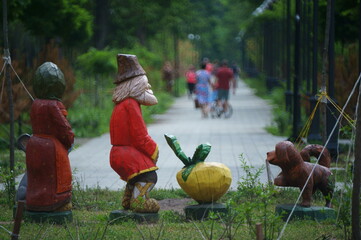 Wall Mural - Blurred background. People relax in the city Park.