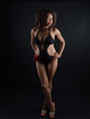 © Magdalena Juillard - Sensual and attractive African American woman wearing a one piece swimsuit