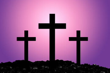 Silhouette Cross Crucifixion Of Jesus Christ on the mountain with Dark Purple and Pink background and wallpaper with Lens Flare, Easter concept.