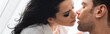 © LIGHTFIELD STUDIOS - Panoramic crop of beautiful woman kissing boyfriend with closed eyes